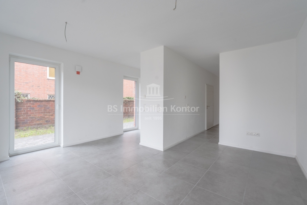 Moderne, behindertengerechte Erdgeschosswohnung im Stadtkern von Papenburg – Erstbezug in Top-Lage - Photo 4